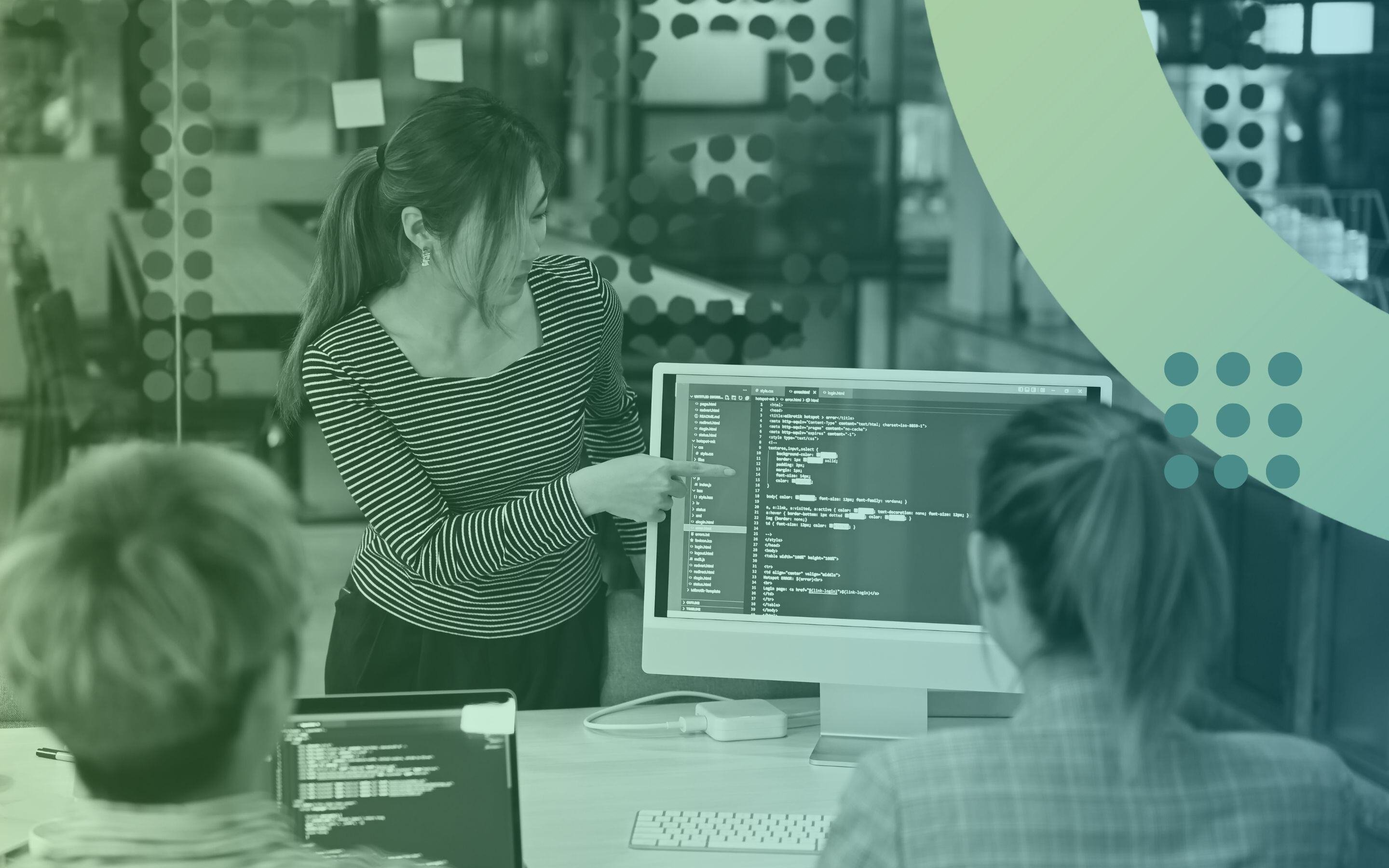 A team of women working together on a computer, highlighting their role in advancing technology and innovation.